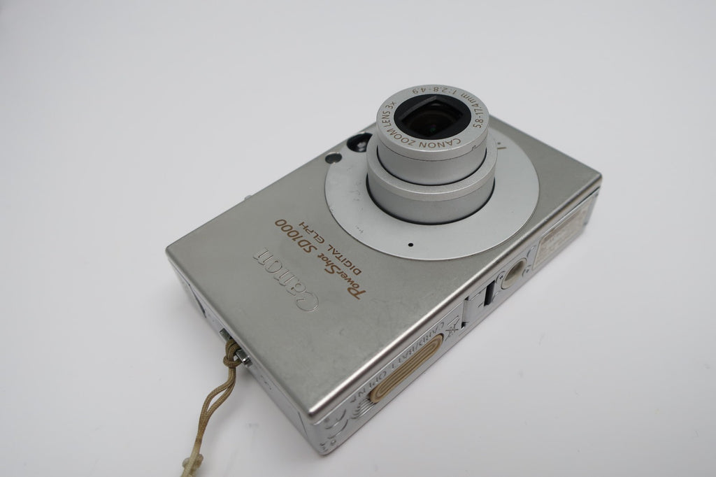 Canon PowerShot Digital ELPH SD1000 7.1MP - Silver W/Battery+Charger TESTED.