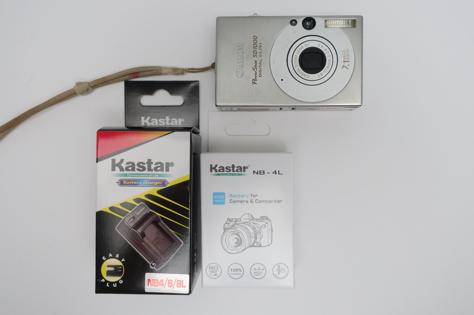Canon PowerShot Digital ELPH SD1000 7.1MP - Silver W/Battery+Charger TESTED.