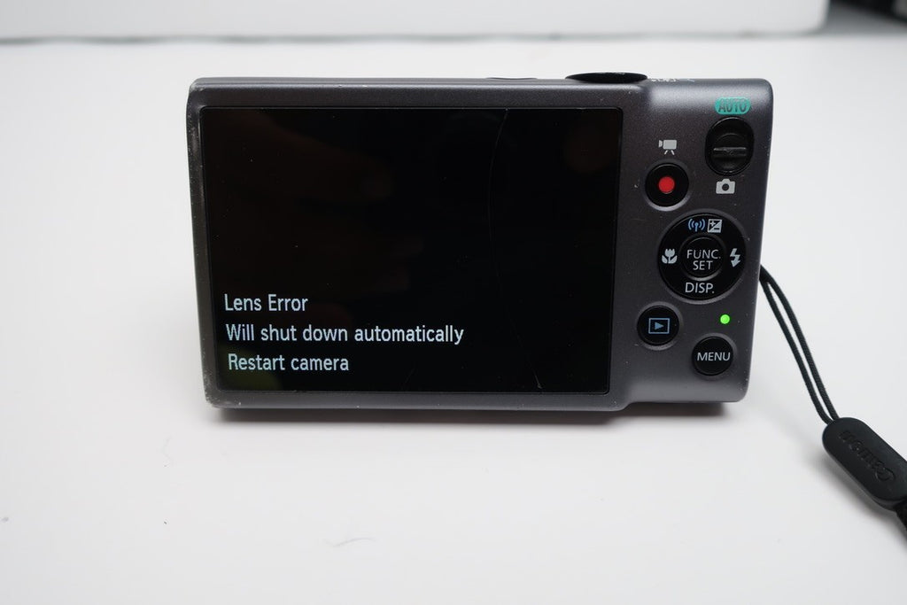 Canon PowerShot ELPH 130 IS 16.0MP Digital Camera FOR PARTS OR REPAIR LENS ER #1
