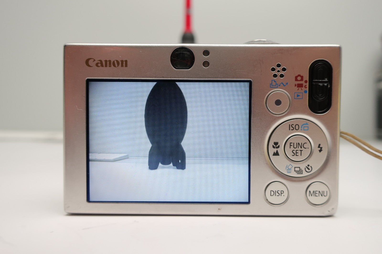 Canon PowerShot Digital ELPH SD1000 7.1MP - Silver W/Battery+Charger TESTED.