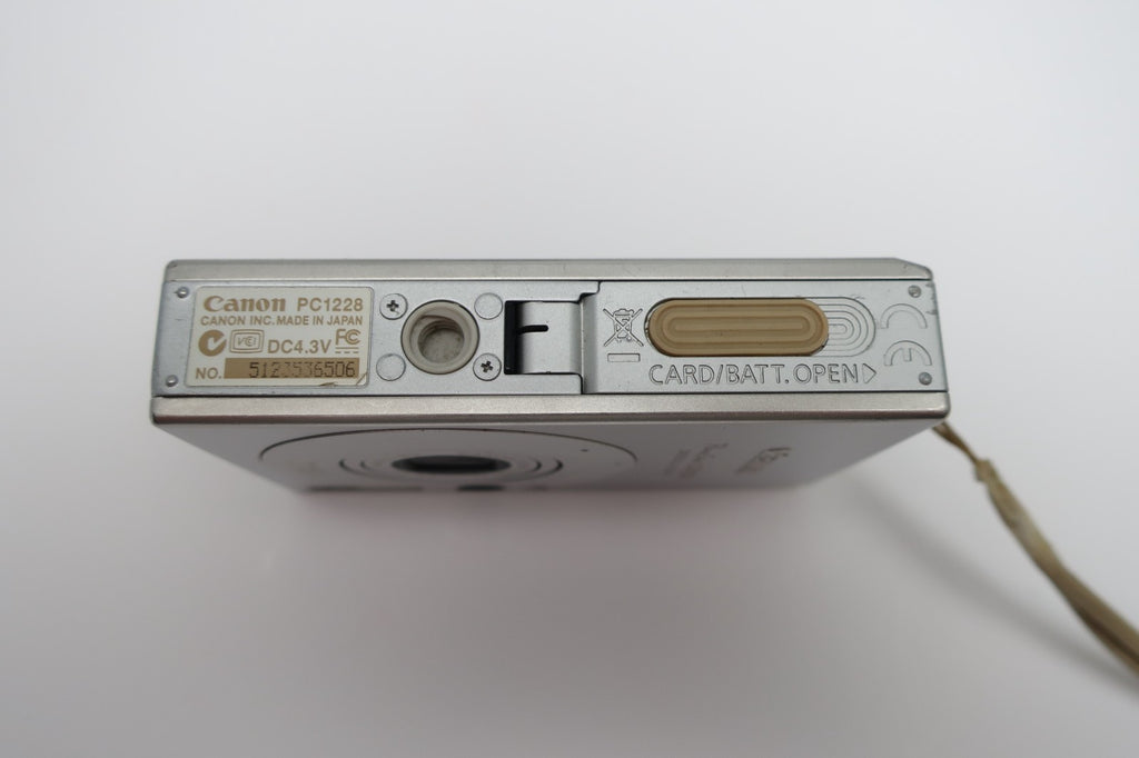 Canon PowerShot Digital ELPH SD1000 7.1MP - Silver W/Battery+Charger TESTED.